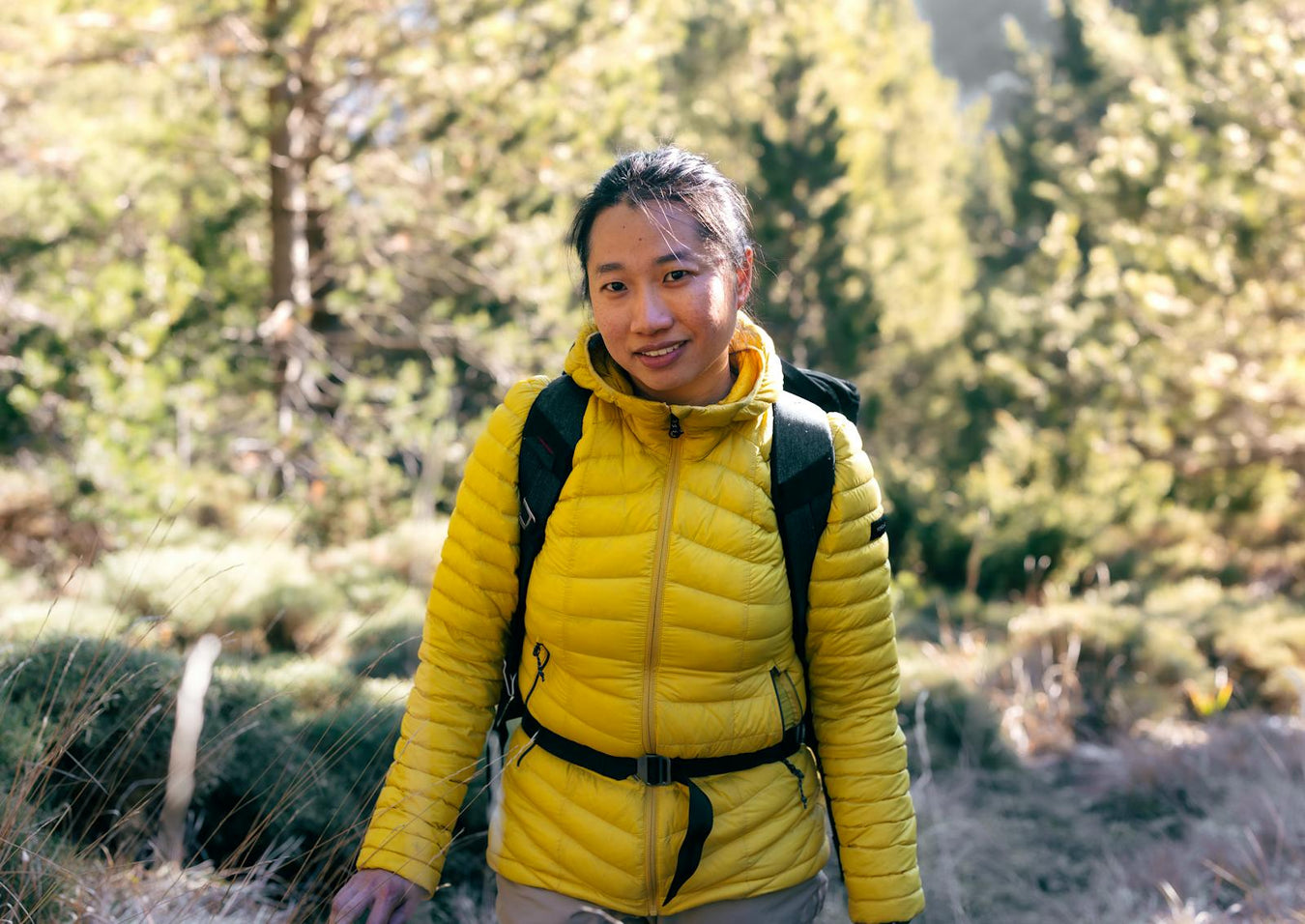 Hiker in jacket exploring outdoors