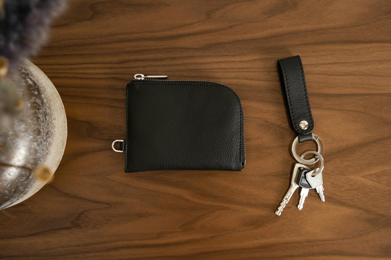 Keys beside leather wallet - card cases