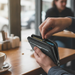 Men's RFID Carbon Fiber Zip-Around Wallet TC310 opened at NZ café - Touch & Catch NZ